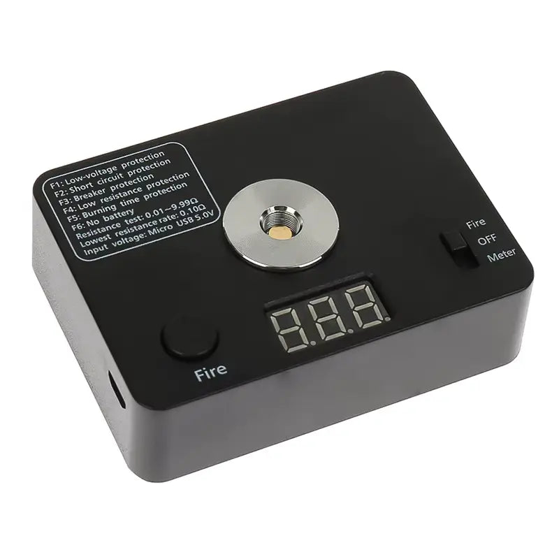 Black electronic device with digital display and fire button on a white background