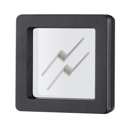 2 Vape Coils with black frame and white face displaying silver hour and minute hands.
