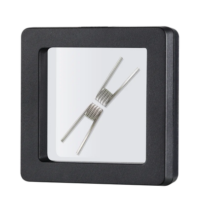 Two vape coils in a black square frame on a white background