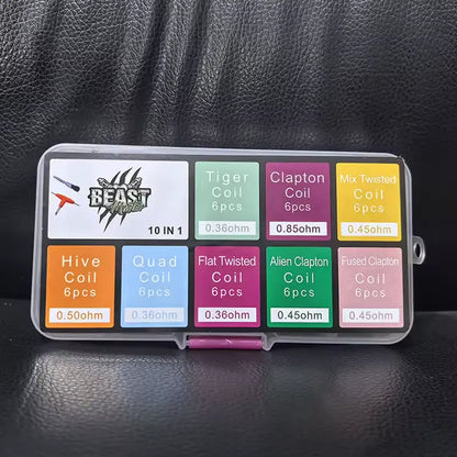 Coil kit with various types of coils in a clear case on a dark textured background