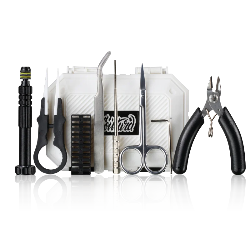 Set of vape tools including scissors, pliers, and a coil trimming tool on a white background