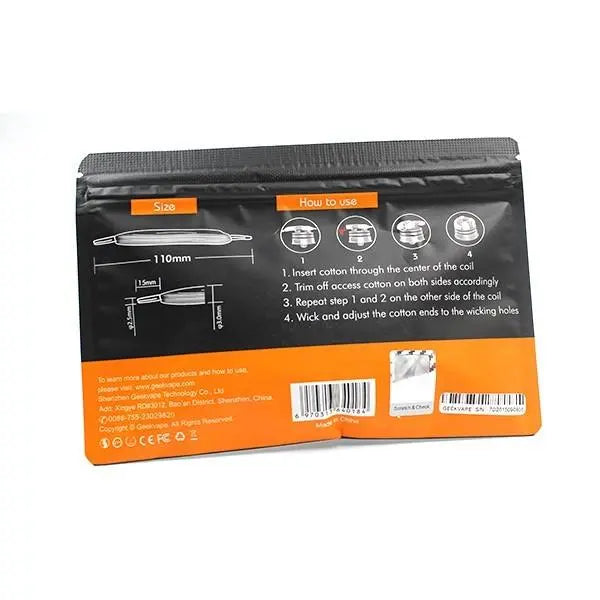 The back of a black and orange resealable pouch package, showing size measurements, usage instructions with icons, and barcodes on a white background.