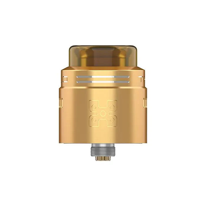 A gold-colored metal vape drip tip with a translucent amber top and a silver threaded base, shown on a plain white background.