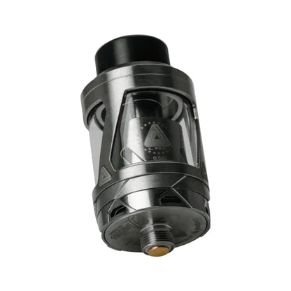 A metallic gray and black vape tank mod with a clear glass chamber and a small brass adjustment screw at the bottom, shown on a plain white background.