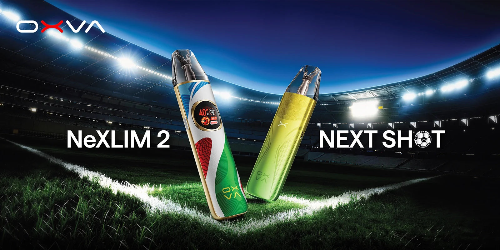 Two OXVA vape devices, labeled NeXLIM 2 and NEXT SHOT, standing on a soccer field with stadium lights in the background. One device is white, green, and red, and the other is yellow-green and clear.