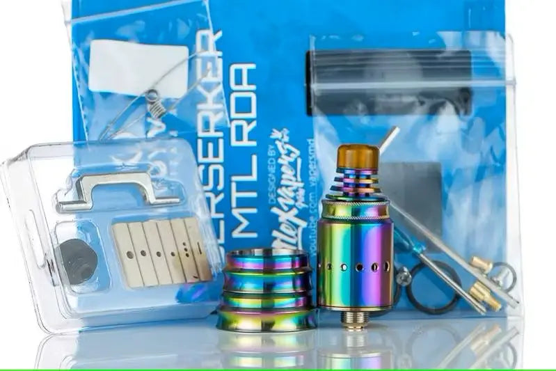 Vandy Vape Berserker MTL RDA components with colourful rainbow design on a clear background
