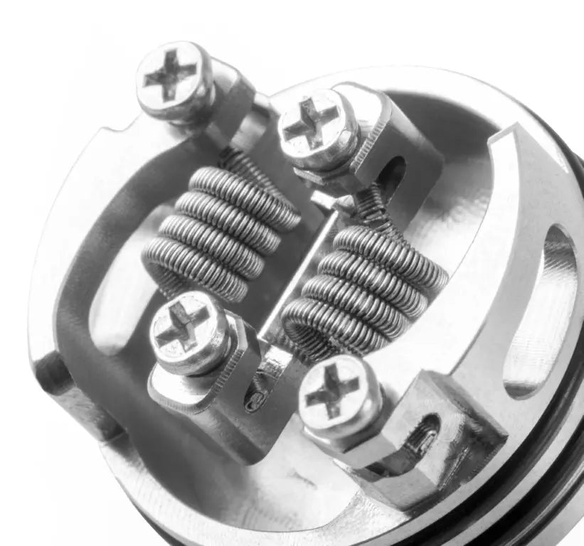 Close-up of the Wotofo Nudge Build deck and dual coil build on a white background