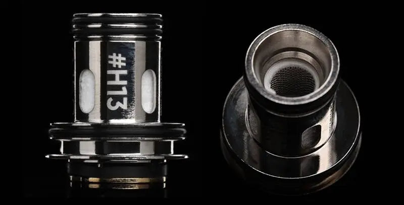 Two metallic cylindrical components shown on a black background, likely replacement parts for a vape device. One is upright with the text '#H13' printed on it, and the other is shown from a side angle.