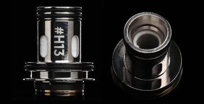 Two metallic cylindrical components shown on a black background, likely replacement parts for a vape device. One is upright with the text '#H13' printed on it, and the other is shown from a side angle.