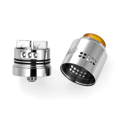 Two metallic vape components on a white background