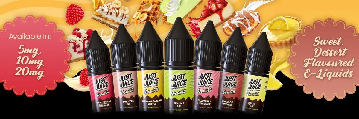 Row of Just Juice e-liquid bottles with colorful labels on a dessert-themed background.